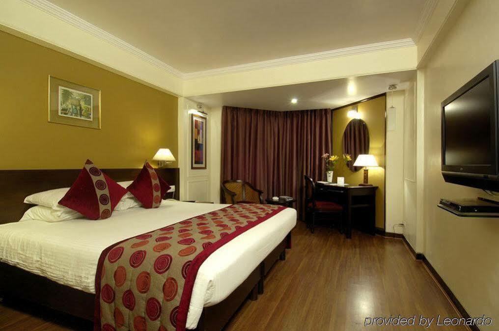 Ramee Guestline Hotel Juhu Мумбай Стая снимка